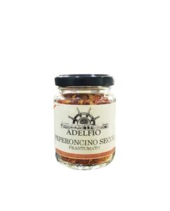 Dried chopped chili pepper in a jar - Adelfio
